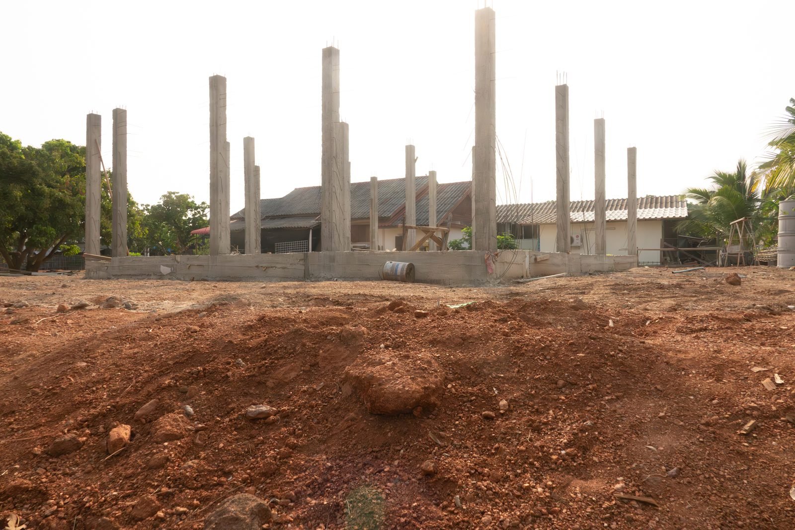Concrete pile foundation for elevated construction