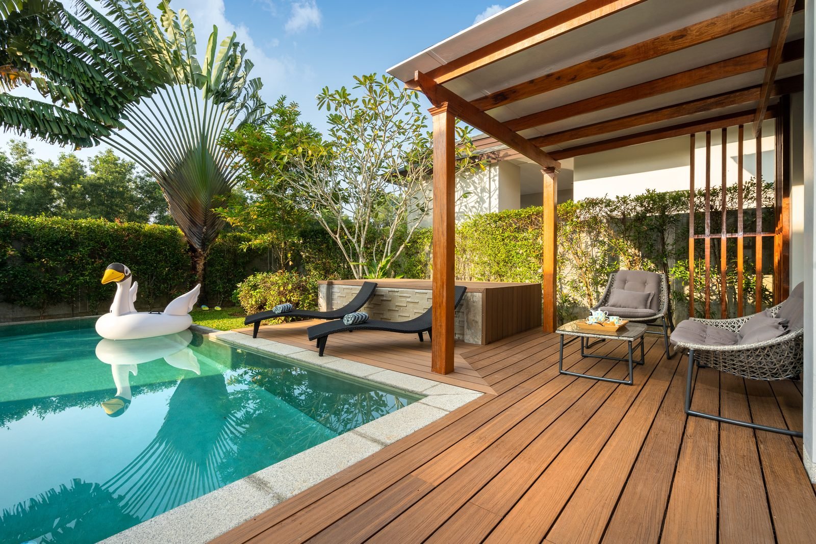 Residential pool with a covered patio enclosure